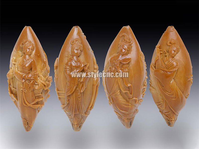 使用數(shù)控雕刻機對劣質(zhì)橄欖核進行雕刻